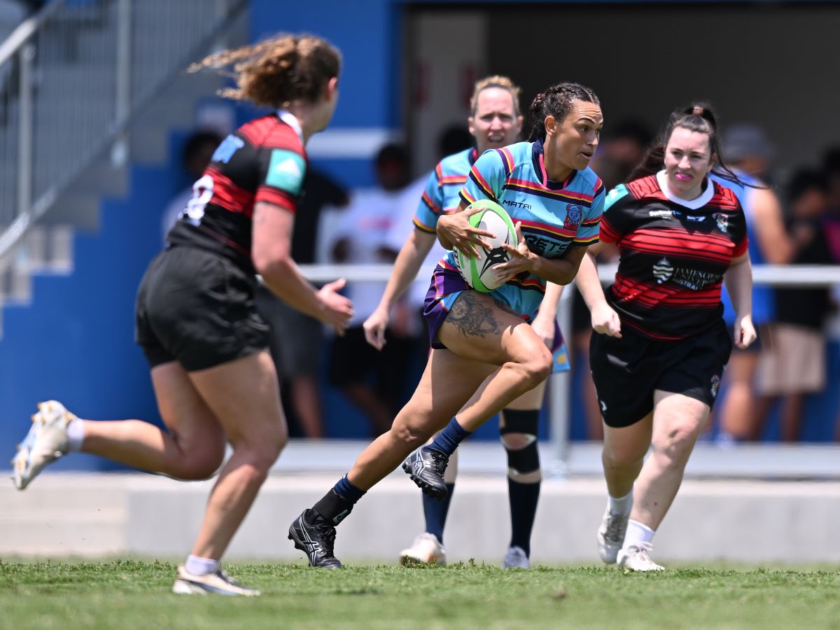 Masters rugby league player kicking football