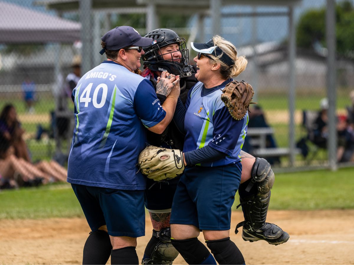 Masters women's softball team celebrating win