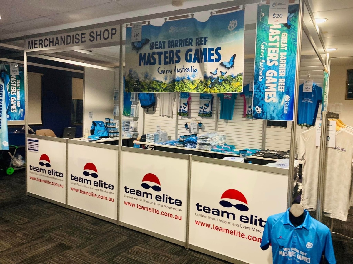 Merchandise hub at the Great Barrier Reef Masters is depicted. The hub features a variety of merchandise